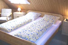Eines der zwei Schlafzimmer mit Doppelbetten